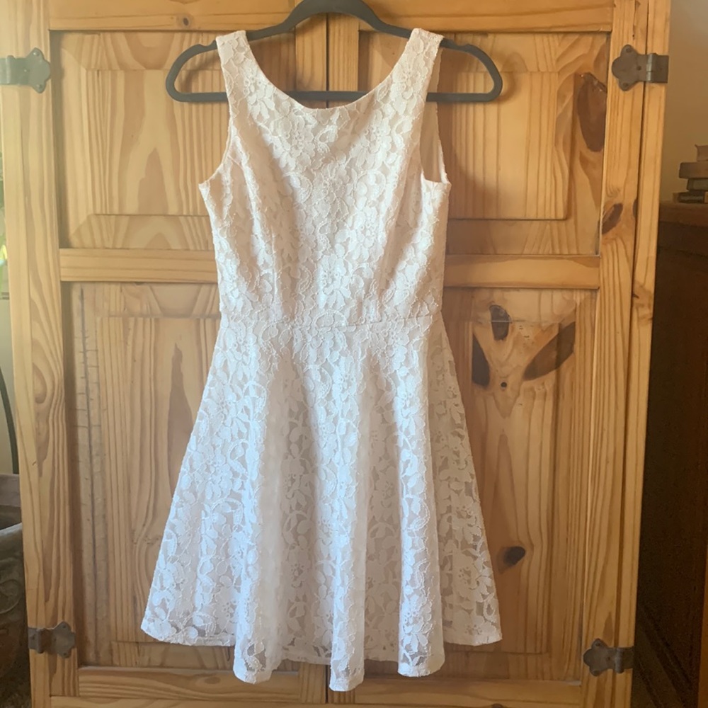 Cream fit and flare semi formal dress.